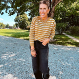 Lightweight, thin, soft striped crewneck long sleeved sweater.