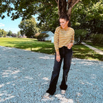 Lightweight, thin, soft striped crewneck long sleeved sweater.