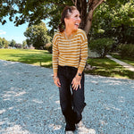 Lightweight, thin, soft striped crewneck long sleeved sweater.