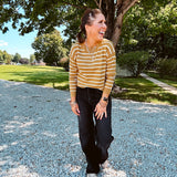 Lightweight, thin, soft striped crewneck long sleeved sweater.
