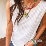 Ribbed textured tank with eyelet crocheted trim. Available in many colors