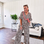 Wide leg lightweight leopard print pants with elastic waist, pockets and ruffled cuffs.