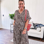 Wide leg lightweight leopard print pants with elastic waist, pockets and ruffled cuffs.