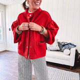 Snap front, balloon sleeve bright red cardigan.