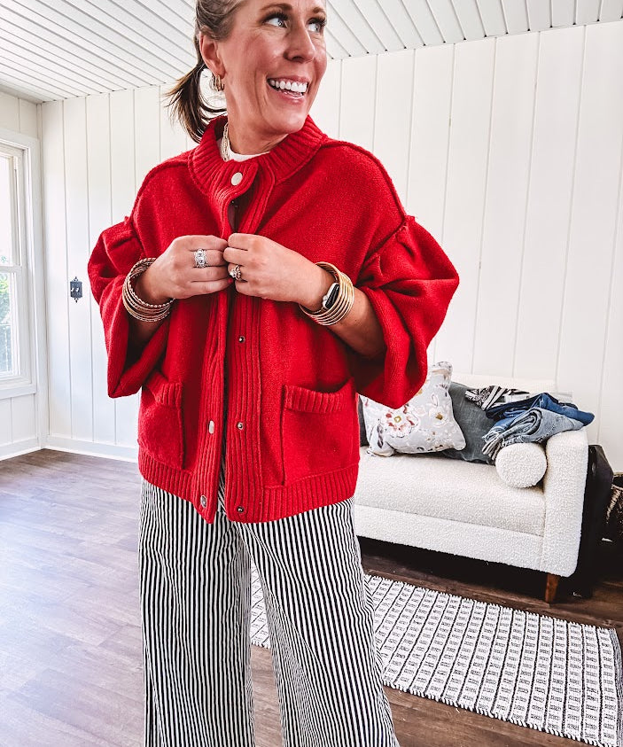 Snap front, balloon sleeve bright red cardigan.