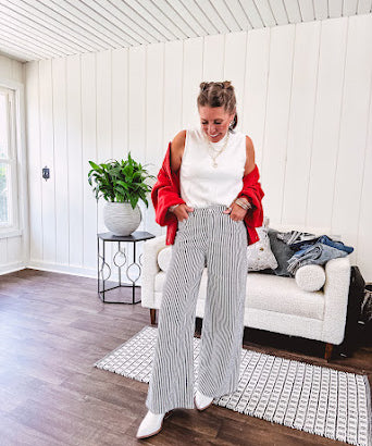 Soft, mock neck sleeveless sweater tank.