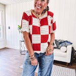 Red and white checkered crocheted short sleeved sweater with tan scalloped neckline and scalloped cuffs and hem.