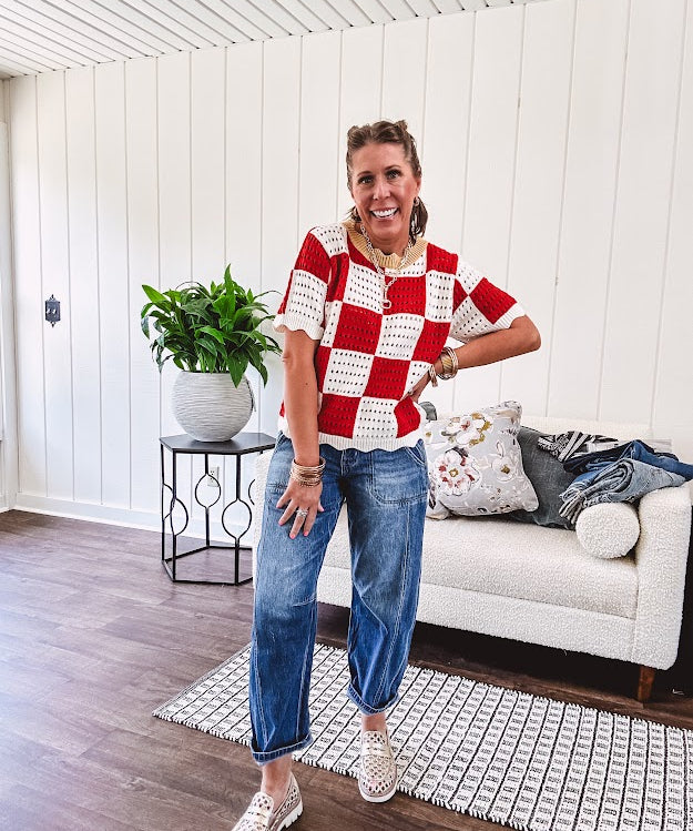 Red and white checkered crocheted short sleeved sweater with tan scalloped neckline and scalloped cuffs and hem.