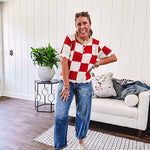 Red and white checkered crocheted short sleeved sweater with tan scalloped neckline and scalloped cuffs and hem.