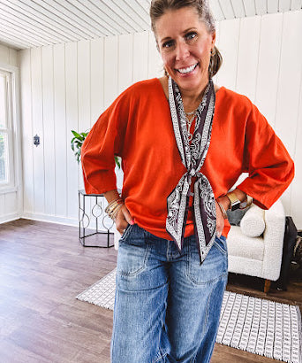 Soft, 3/4 sleeve V neck blouse.