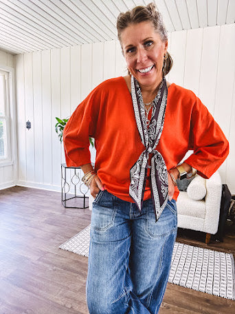 Soft, 3/4 sleeve V neck blouse.