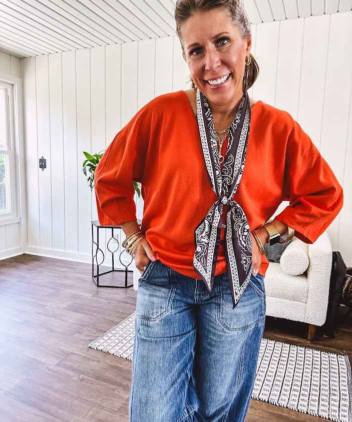 Soft, 3/4 sleeve V neck blouse.