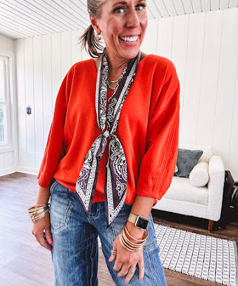 Soft, 3/4 sleeve V neck blouse.