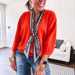 Soft, 3/4 sleeve V neck blouse.