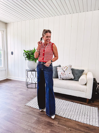 Soft comfort-stretch denim with an easy, flexible fit
Flattering mid-rise waist
Classic five-pocket design
Full-length wide-leg silhouette
Features a trouser-inspired front fold crease detail
Finished hem for a polished look
Dark wash denim