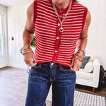 Thin red and white striped sleeveless vest with gold buttons down the front.