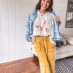Oversized ivory tee with "LOVE" patchwork and heart patchwork detail on the front with lace trim in pastel florals and plaids.