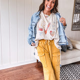 Oversized ivory tee with "LOVE" patchwork and heart patchwork detail on the front with lace trim in pastel florals and plaids.