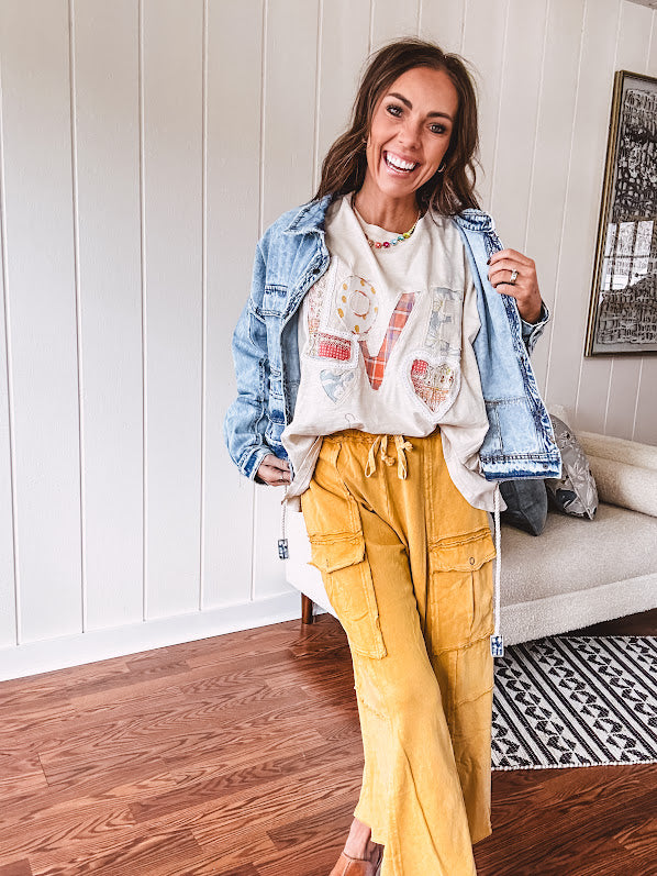Oversized ivory tee with "LOVE" patchwork and heart patchwork detail on the front with lace trim in pastel florals and plaids.