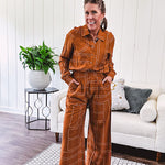 Lightweight rust button front long sleeved shirt with collar and white geometric stitching print throughout.