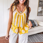 Lace crochet tank in bold marigold and white with lace and crochet details through, V neck.