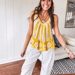 Lace crochet tank in bold marigold and white with lace and crochet details through, V neck.