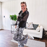 Lightweight grey, cream and black washed star graphic wide leg pants with waffle texture insert on the sides of the legs.