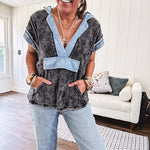 Washed black short sleeved top with matching hood trimmed in light washed chambray denim with kangaroo pocket.
