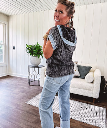 Washed black short sleeved top with matching hood trimmed in light washed chambray denim with kangaroo pocket.