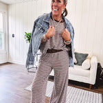 Lightweight ribbed texture brown and white striped short sleeve top and matching wide leg bottoms with elastic waist and contrasting dark brown waffle texture neckline and waistband.