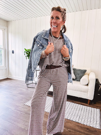 Lightweight ribbed texture brown and white striped short sleeve top and matching wide leg bottoms with elastic waist and contrasting dark brown waffle texture neckline and waistband.