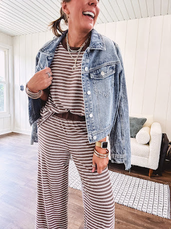 Lightweight ribbed texture brown and white striped short sleeve top and matching wide leg bottoms with elastic waist and contrasting dark brown waffle texture neckline and waistband.