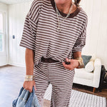 Lightweight ribbed texture brown and white striped short sleeve top and matching wide leg bottoms with elastic waist and contrasting dark brown waffle texture neckline and waistband.