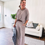 Lightweight ribbed texture brown and white striped short sleeve top and matching wide leg bottoms with elastic waist and contrasting dark brown waffle texture neckline and waistband.