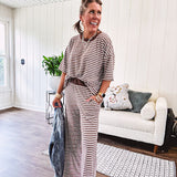 Lightweight ribbed texture brown and white striped short sleeve top and matching wide leg bottoms with elastic waist and contrasting dark brown waffle texture neckline and waistband.