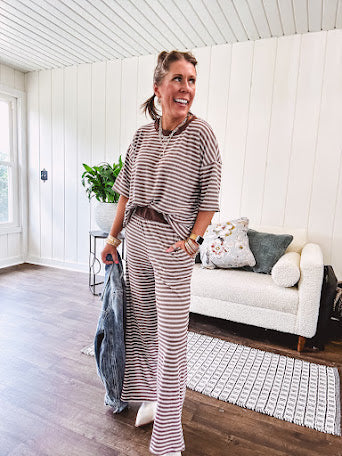 Lightweight ribbed texture brown and white striped short sleeve top and matching wide leg bottoms with elastic waist and contrasting dark brown waffle texture neckline and waistband.