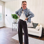 Buttery soft black lounge pants with white striping down the sides and elastic waist with pleated front.