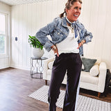 Buttery soft black lounge pants with white striping down the sides and elastic waist with pleated front.