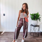 Ribbed texture stretchy tube top with gathering at the bust and cropped hem.