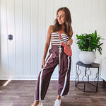 Ribbed texture stretchy tube top with gathering at the bust and cropped hem.