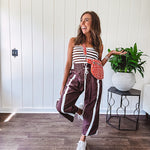 Ribbed texture stretchy tube top with gathering at the bust and cropped hem.