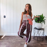 Ribbed texture stretchy tube top with gathering at the bust and cropped hem.
