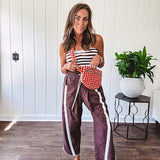 Ribbed texture stretchy tube top with gathering at the bust and cropped hem.