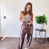Ribbed texture stretchy tube top with gathering at the bust and cropped hem.