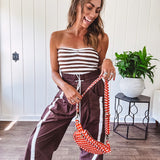 Ribbed texture stretchy tube top with gathering at the bust and cropped hem.