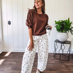 Medium Brown sweatshirt with round neck, 1/2 puff sleeves. Dress up or down.