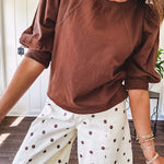 Medium Brown sweatshirt with round neck, 1/2 puff sleeves. Dress up or down.
