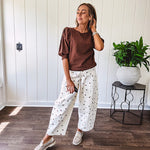 Medium Brown sweatshirt with round neck, 1/2 puff sleeves. Dress up or down.