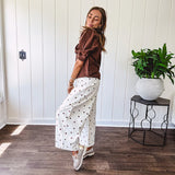 Medium Brown sweatshirt with round neck, 1/2 puff sleeves. Dress up or down.