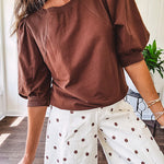 Medium Brown sweatshirt with round neck, 1/2 puff sleeves. Dress up or down.